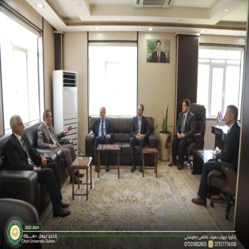 a delegation of Cihan University-Duhok, led by Prof. Dr. Zervan Abdulmohsen Assad, President of the University, visited Newroz University and was welcomed by Asst. Prof. Mevan Arif Badi